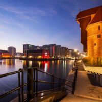Medieval port crane on Motlawa river in Gdansk old town. Medieval port crane in Gdansk old town. Slawek Staszczuk Photography.