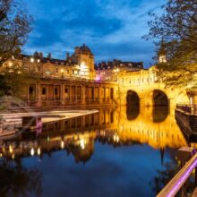 Night falls at Pulteney Bridge in Bath.