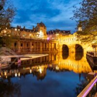 Night falls at Pulteney Bridge in Bath.