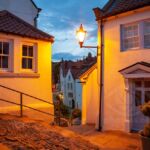 Night falls in Robin Hood's Bay.