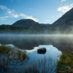 Mist crawls across Crummock Water.