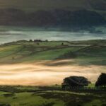 Morning mists crawling across the Cumbrian countryside.